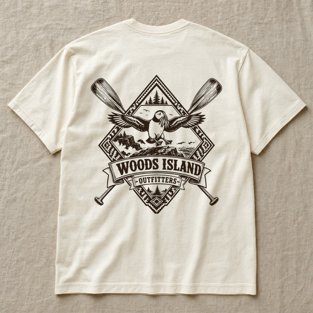 Atlantic Puffin crest on the back of an ivory Woods Island Outfitters tee