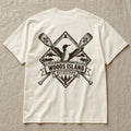 Common Loon crest on the back of an ivory Woods Island Outfitters tee