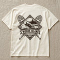 River Otter crest on the back of an ivory Woods Island Outfitters tee