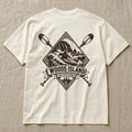 Kayak crest on the back of an ivory Woods Island Outfitters tee